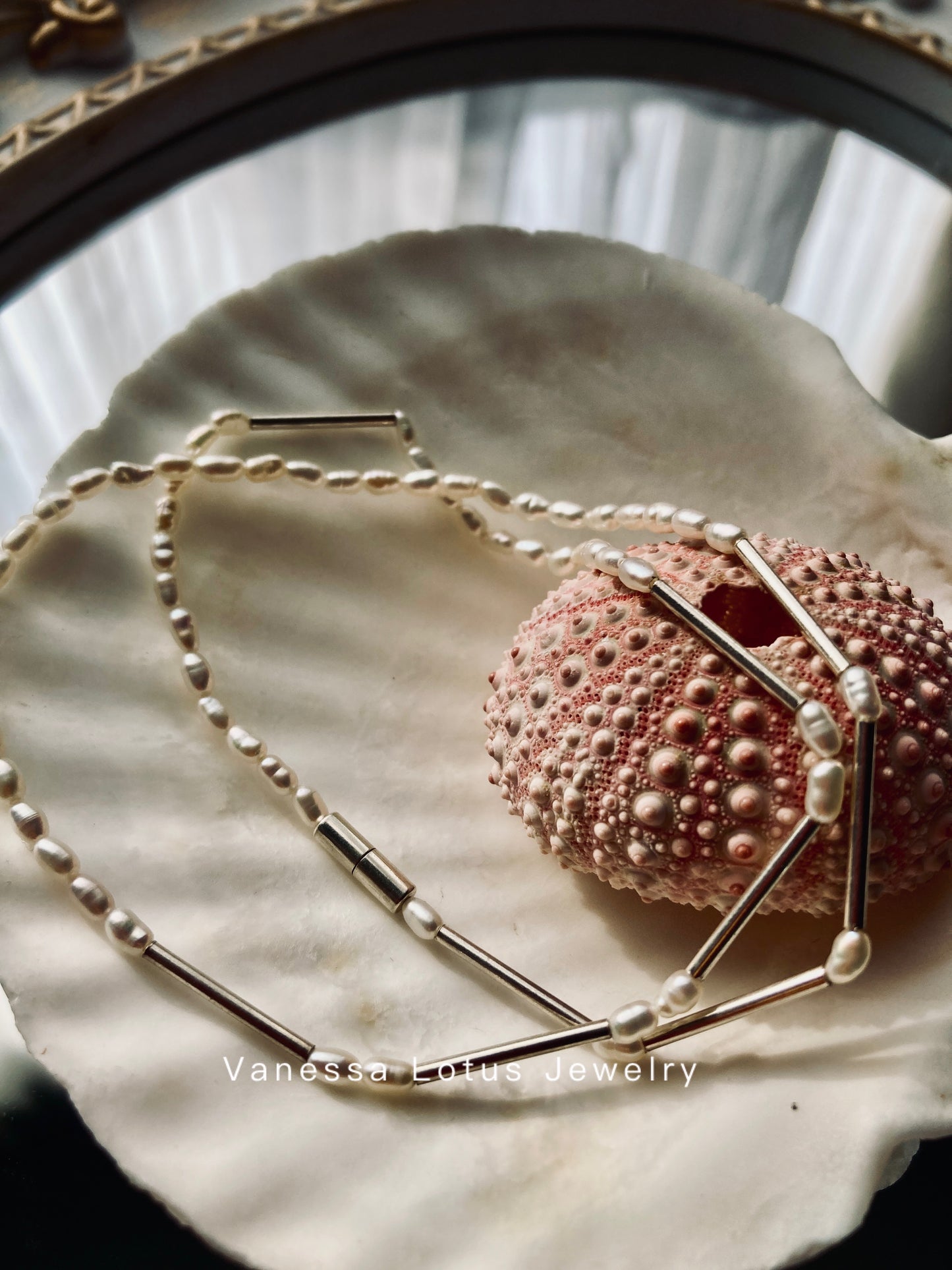 Minimalist pearl and silver necklace