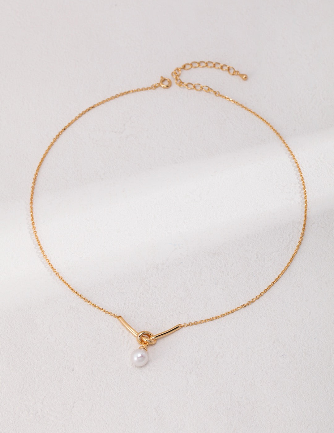 Lucky Knot Pearl Necklace