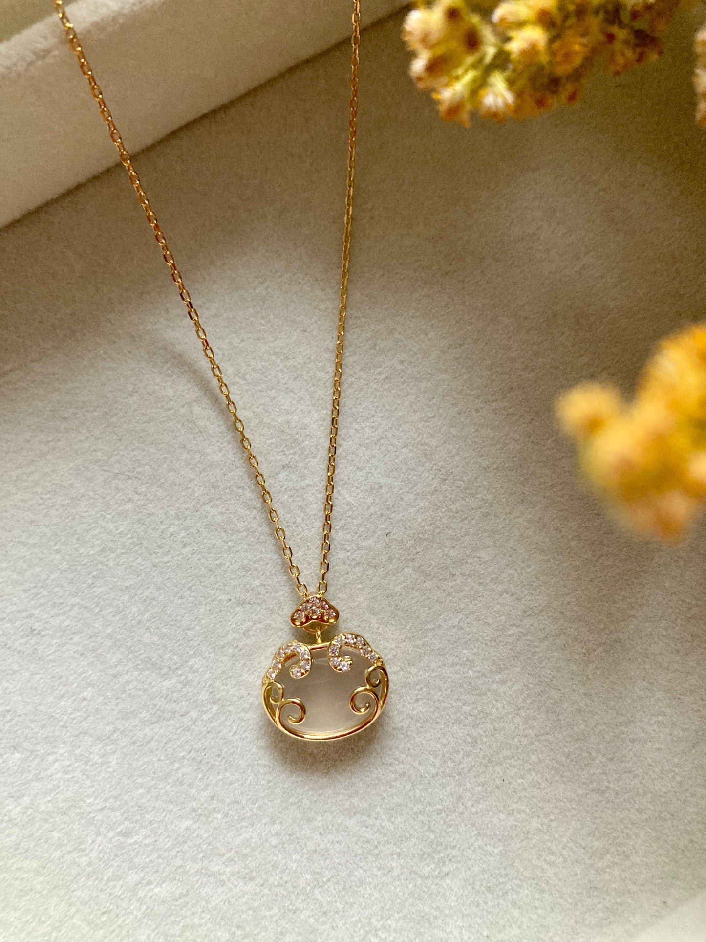 Golden purse necklace