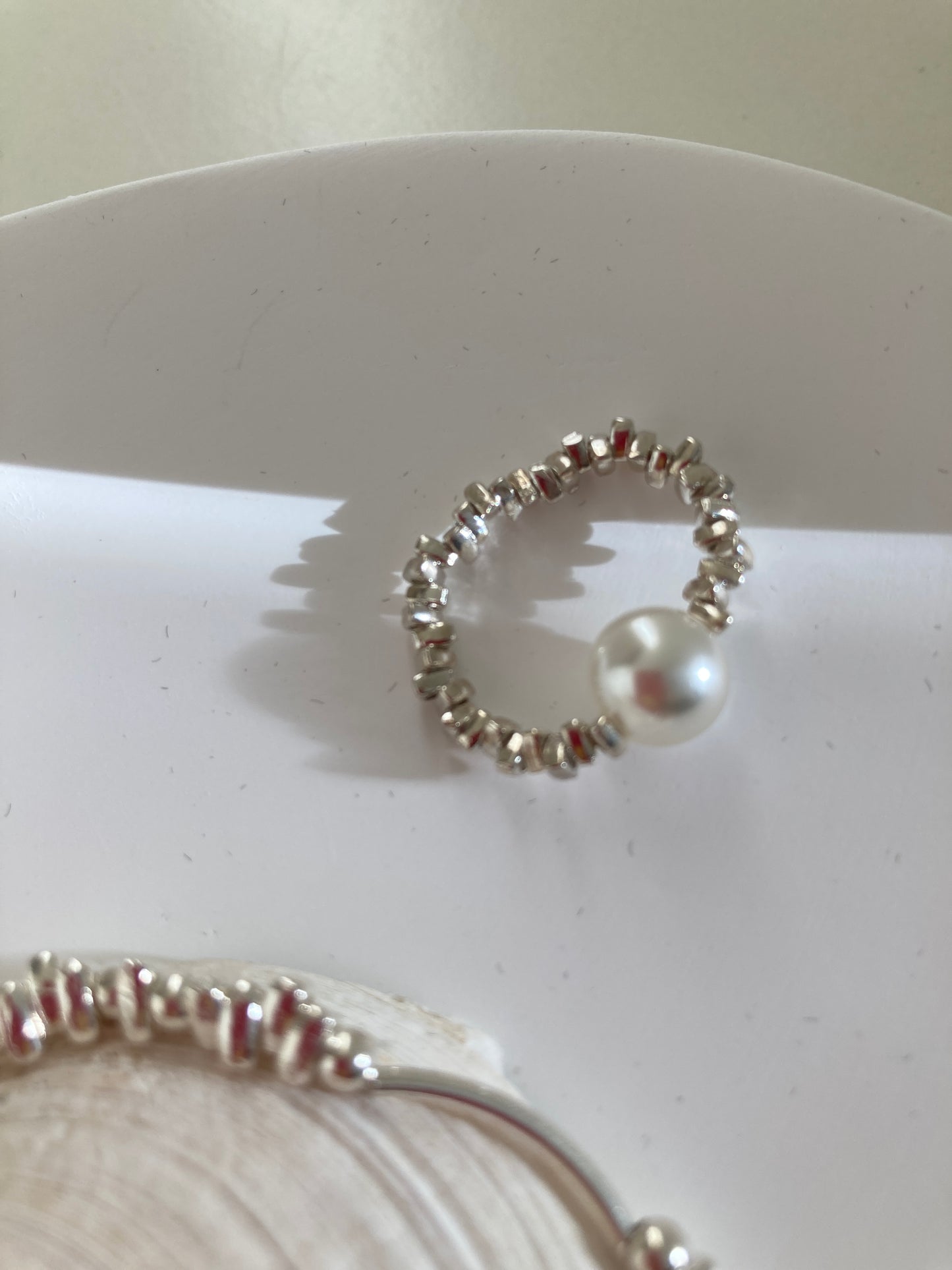 Pearl and silver chip ring