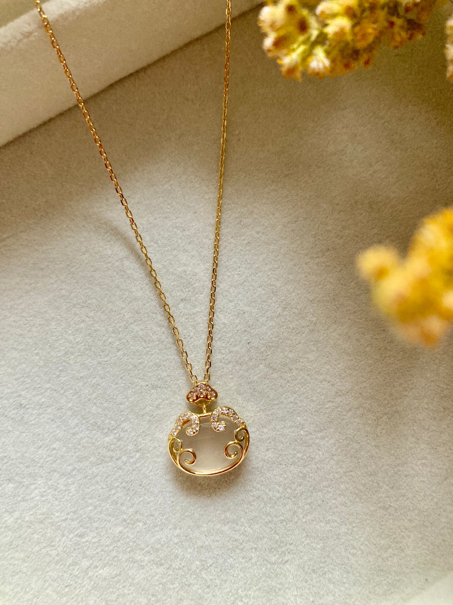 Golden purse necklace