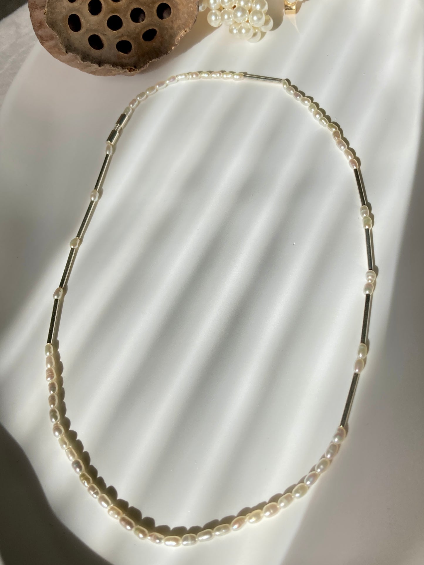 Minimalist pearl and silver necklace