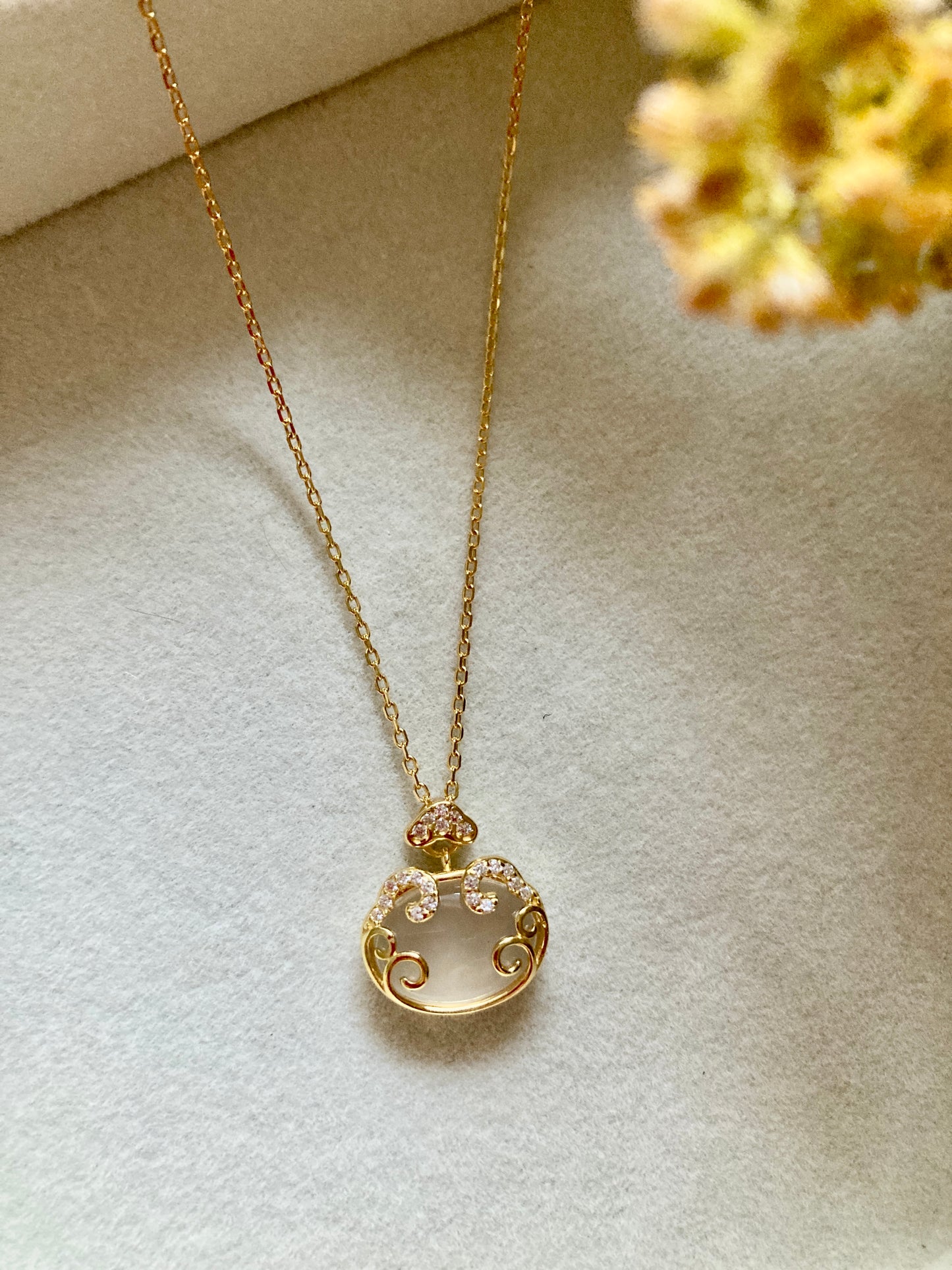 Golden purse necklace