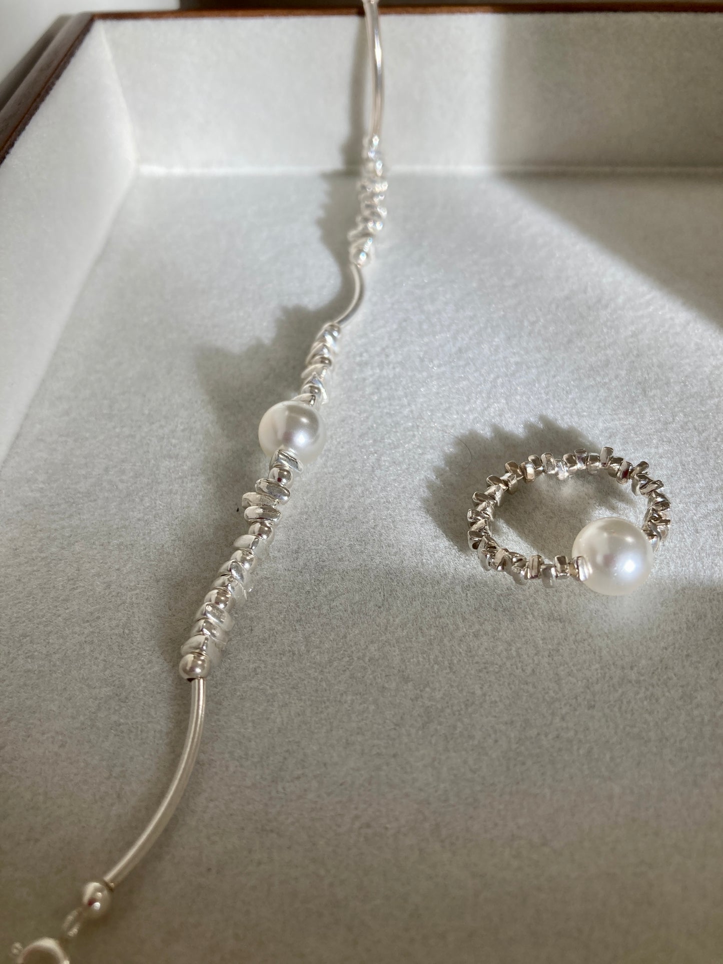 Pearl and silver chip ring