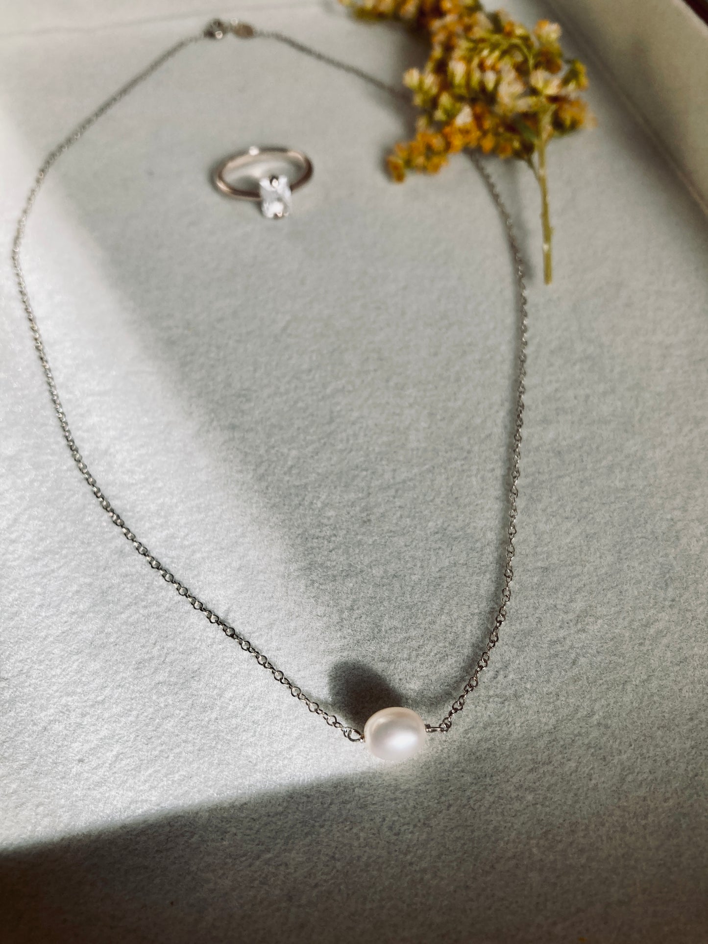 Minimalist pearl and silver necklace