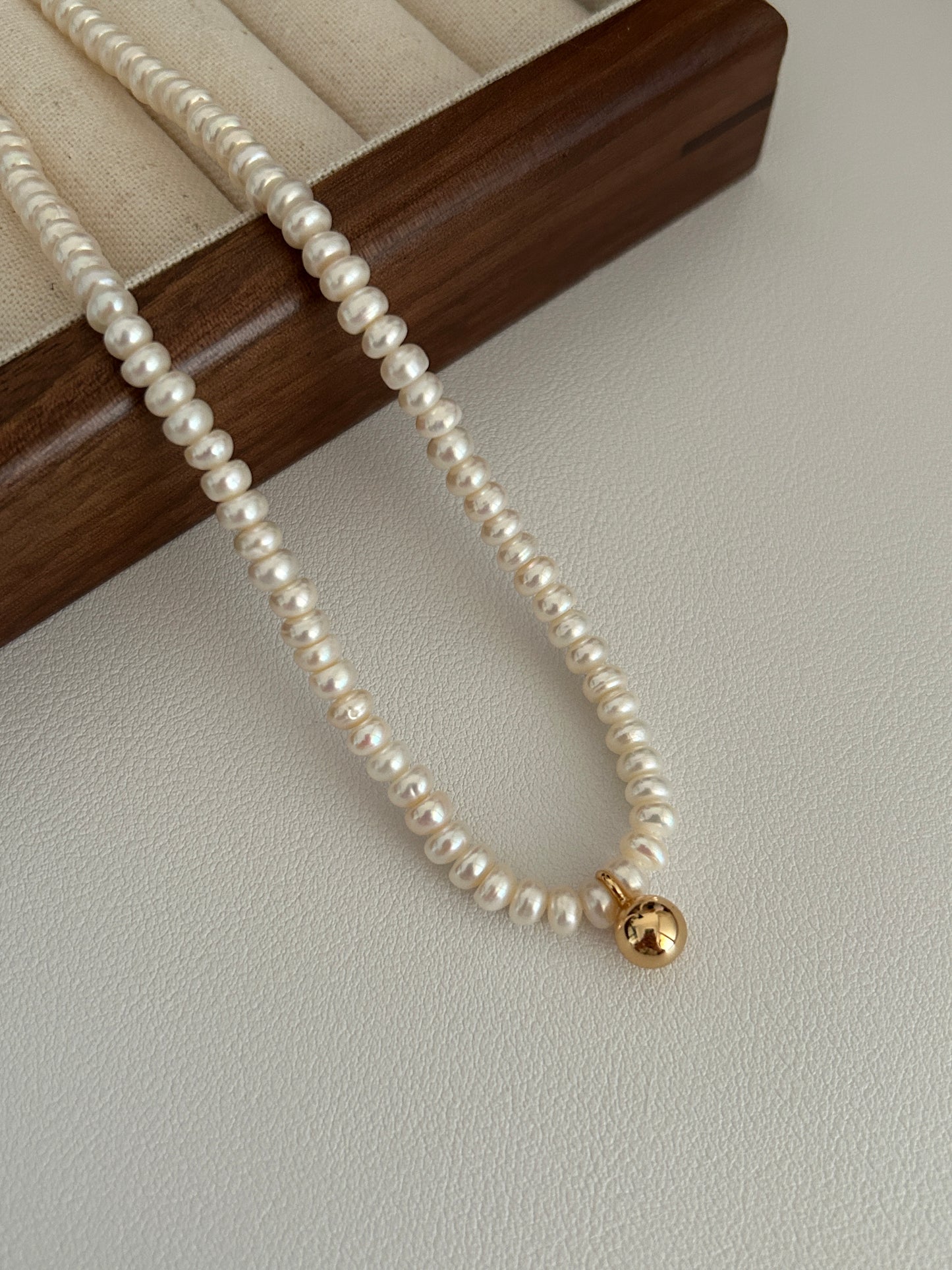 Golden Sphere Pearl Necklace