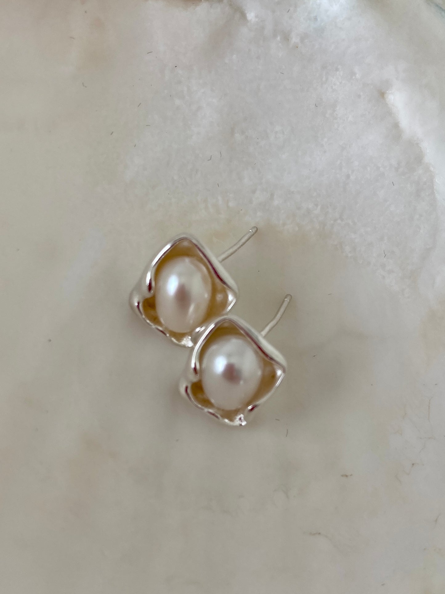 Pearl stud earrings