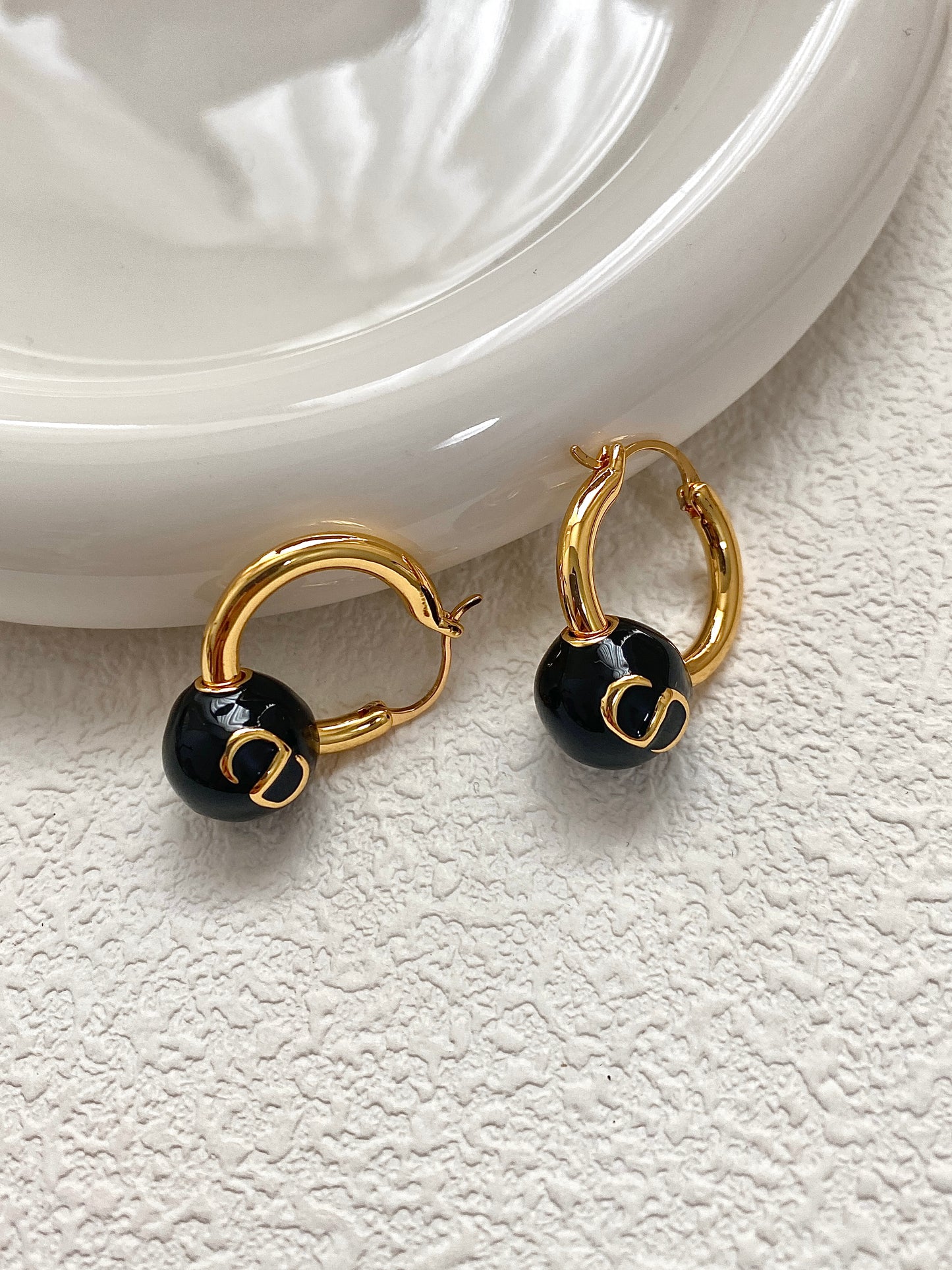 Black glazed bead earrings