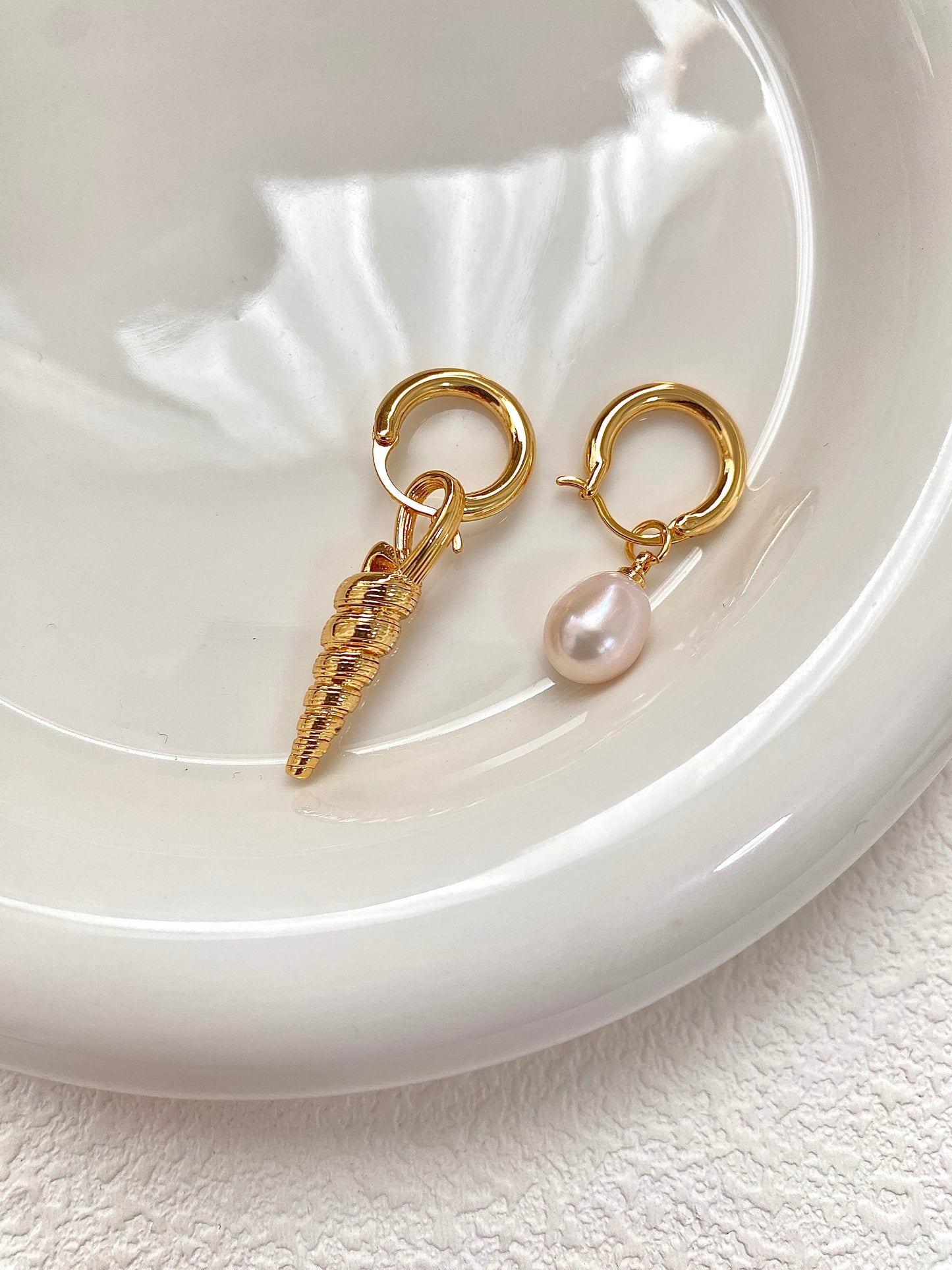 Pearl and seashell earrings
