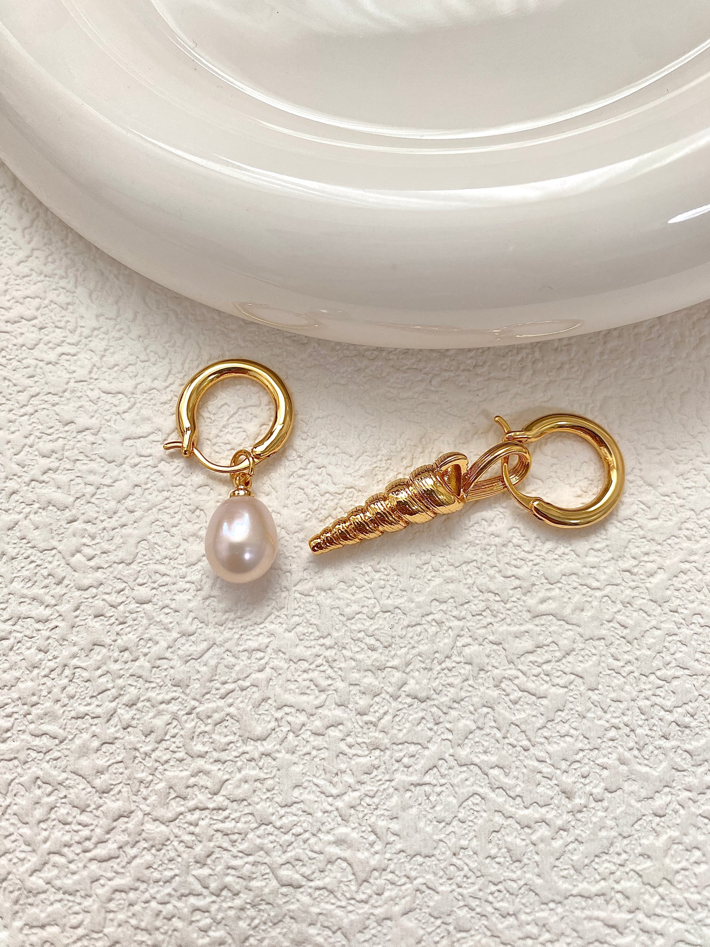 Pearl and seashell earrings