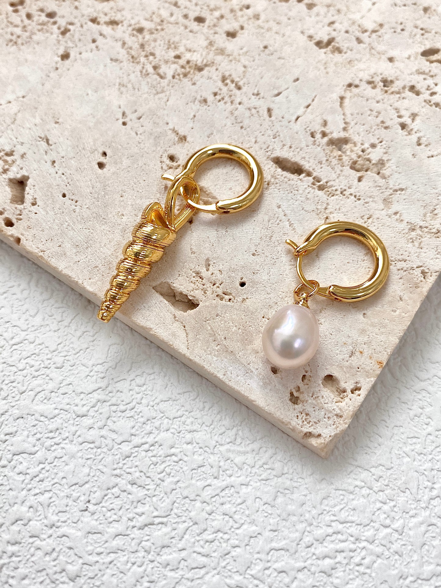 Pearl and seashell earrings
