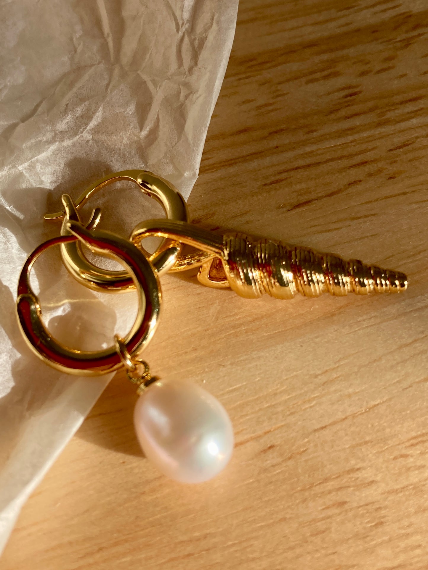 Pearl and seashell earrings