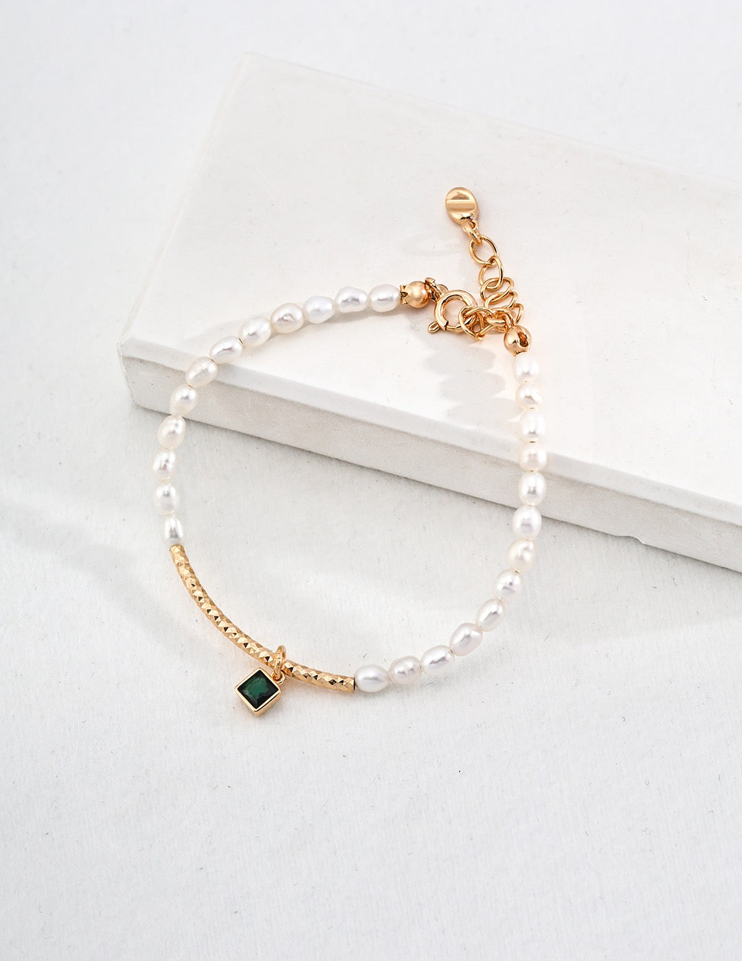 Pearl Bracelet with Green Gemstone