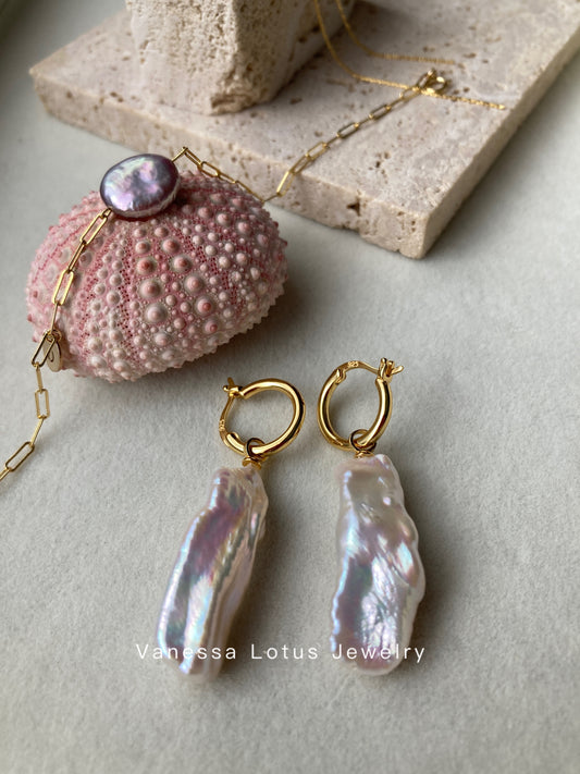 Long baroque pearl earrings