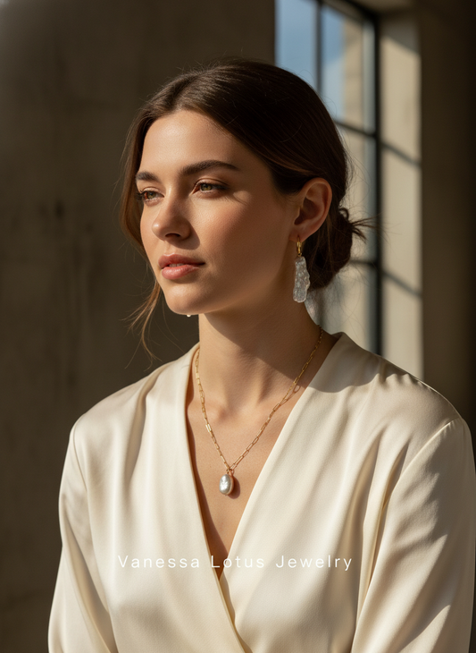 Long baroque pearl earrings