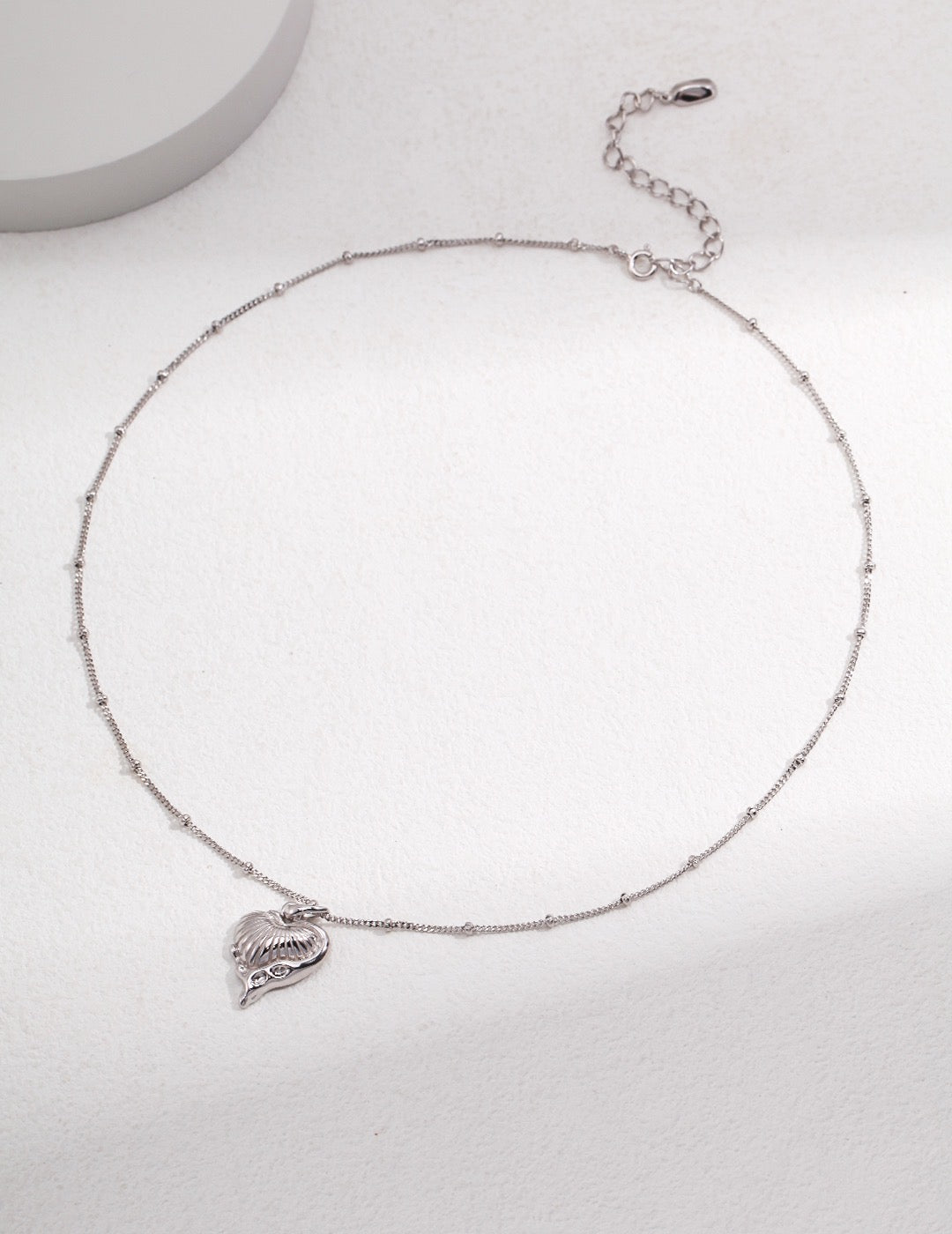 Sterling silver necklace with heart shaped pendant