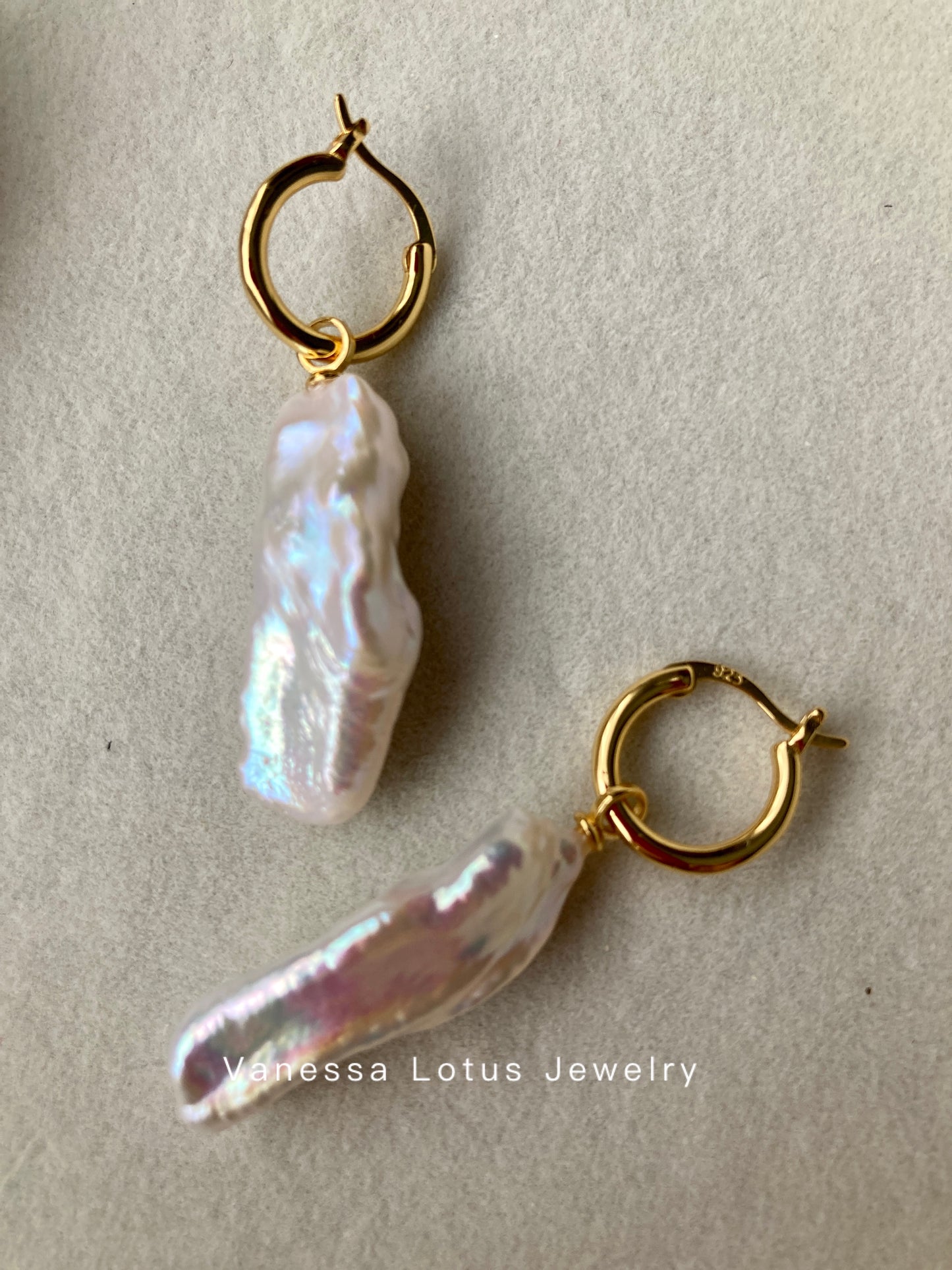 Long baroque pearl earrings