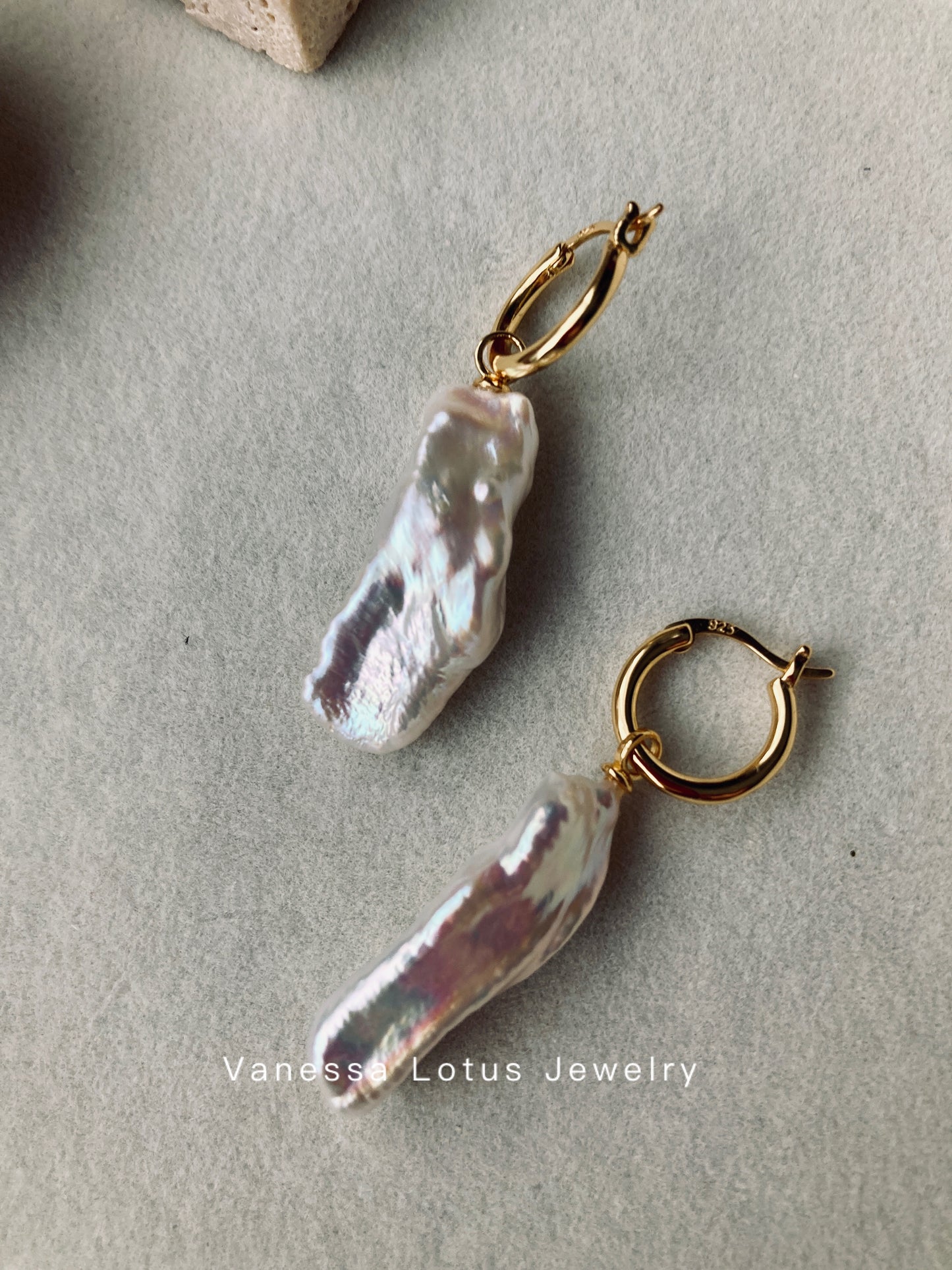 Long baroque pearl earrings
