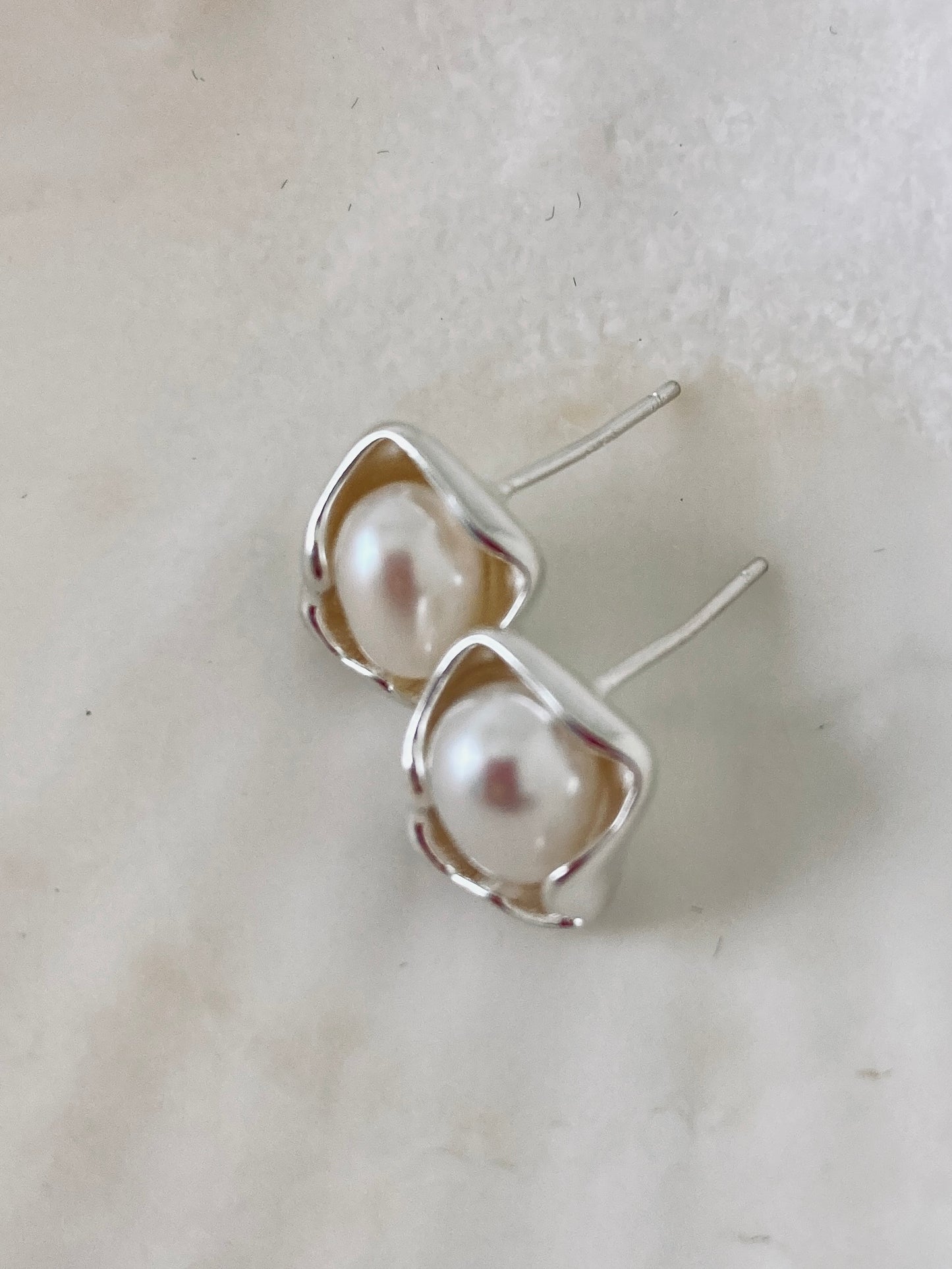 Pearl stud earrings