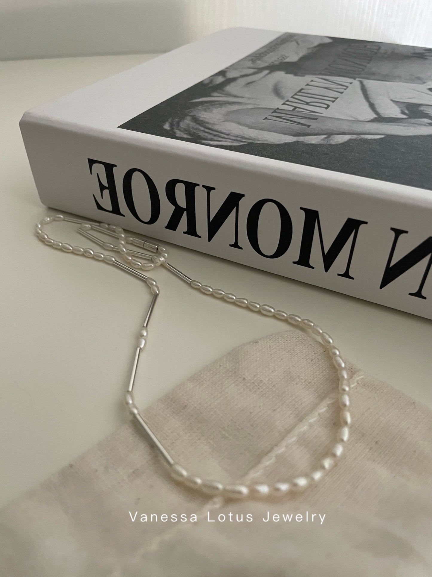 Minimalist pearl and silver necklace