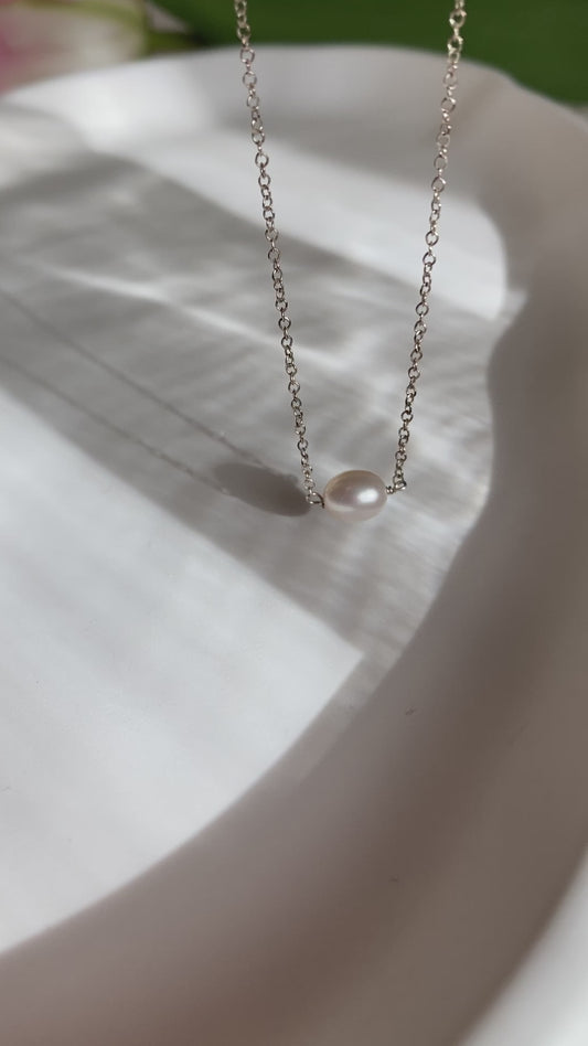 Minimalist pearl and silver necklace